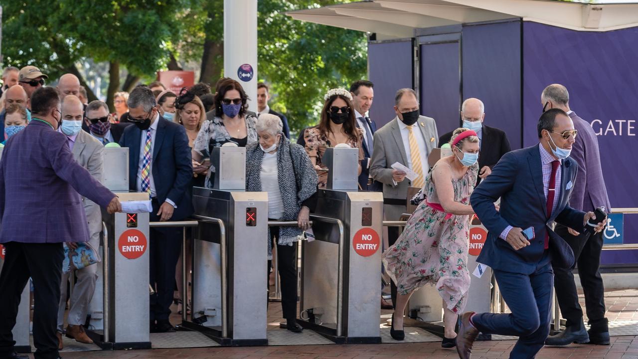 Gates open as the first punters run for their favourite spots. Picture: Jason Edwards