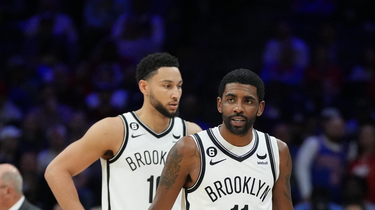 Ben Simmons and Kyrie Irving. Photo by Mitchell Leff/Getty Images.