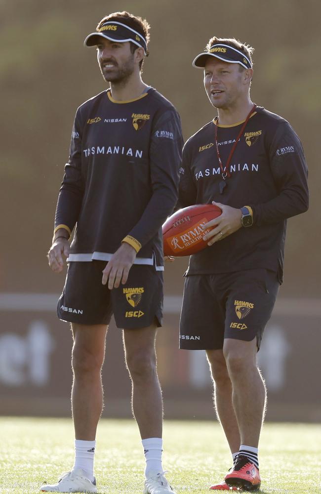 Impey says Hawthorn backline coach Kade Simpson (left) has been ‘huge’ for the Hawks in his first year at the club. Picture: Michael Klein