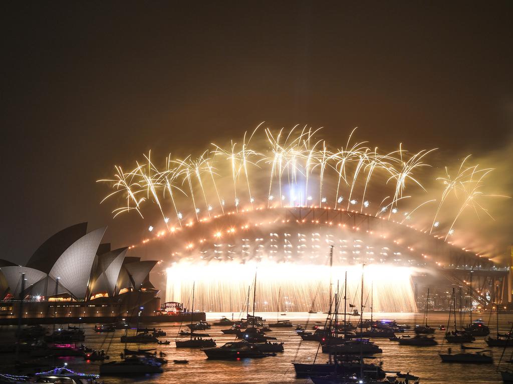 Fireworks explode over the Sydney Harbour Bridge and the Sydney Opera House during New Year's Eve celebrations on January 1, 2020 in Sydney, Australia. Picture: Getty Images