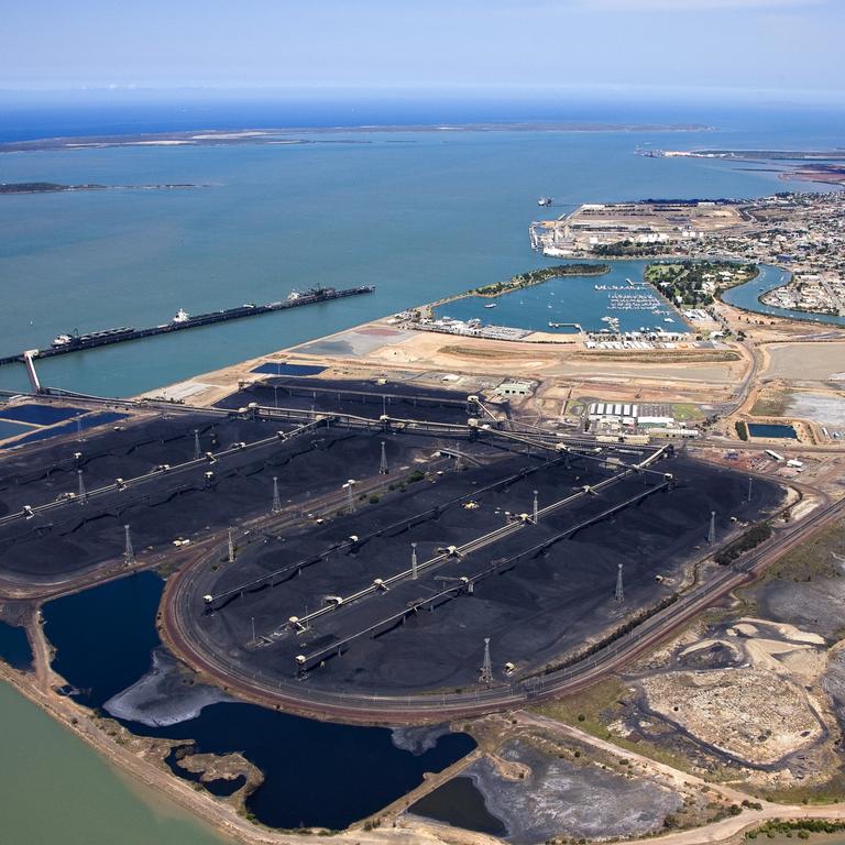 Aerial view of coal mounds ready for export in Gladstone, Queensland. Picture: NewsCorp
