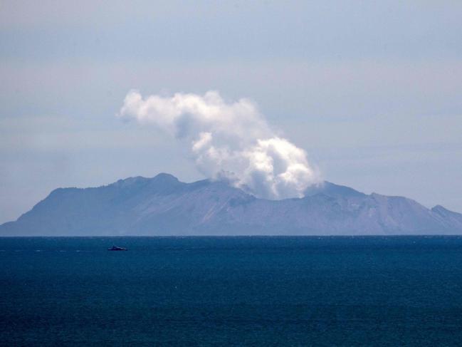 (FILES) Steam rises from the White Island volcano following the December 9 volcanic eruption, in Whakatane on December 11, 2019. The New Zealand firm that managed a volcanic island which erupted killing 22 people in 2019, was on October 31, 2023 found guilty of failing to adequately protect visitors. (Photo by Marty MELVILLE / AFP)