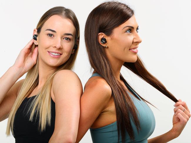 Ashleigh Glinster and Tara Croker model Sennheiser Bluetooth headphones. Photo Lachie Millard