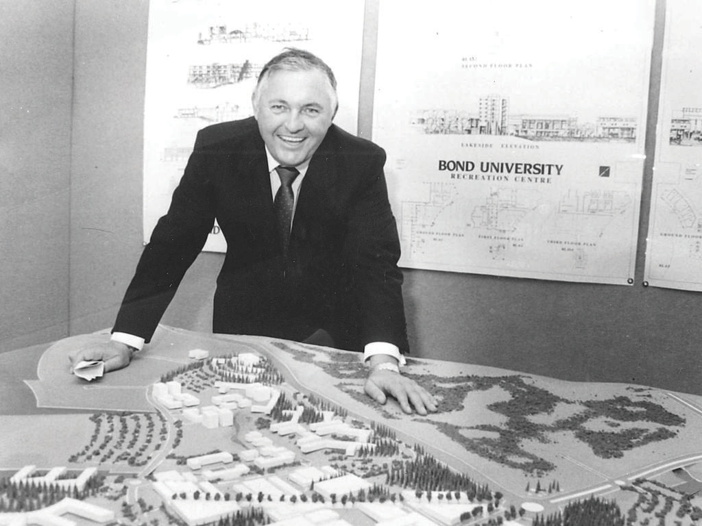 ONE of Australia’s most dominant business figures of the 1980s, the colourful Bond once headed a global empire that spanned media, brewing, resources and property assets worth billions of dollars. Alan Bond with model of Bond University. Picture: News Corp