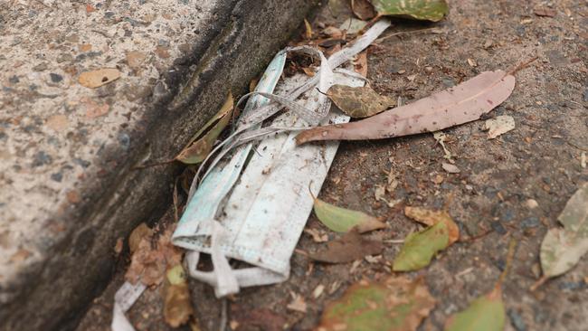 Masks are among the wave of waste ending up in landfill and waterways during the pandemic. Picture: John Grainger