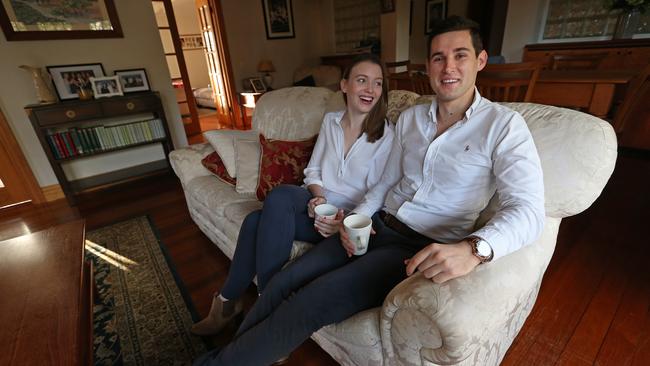 Sam Williams, 24, with his partner Jessica Piotrowski, 21, at his family’s home in Brisbane’s Coorparoo. ‘It’s a quite small window in the grand scheme’. Picture: Lyndon Mechielsen