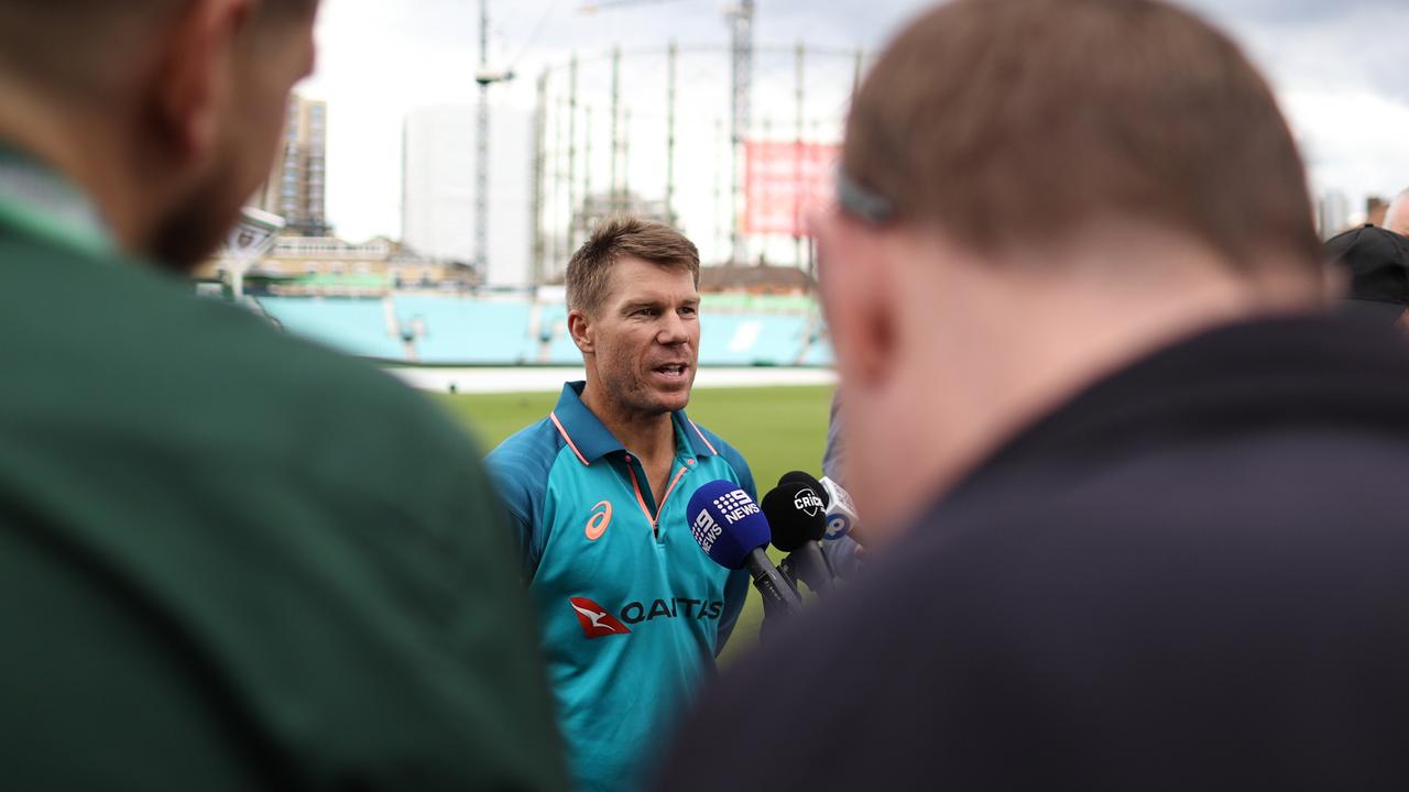 David Warner speaks to reporters. (Photo by Ryan Pierse/Getty Images)