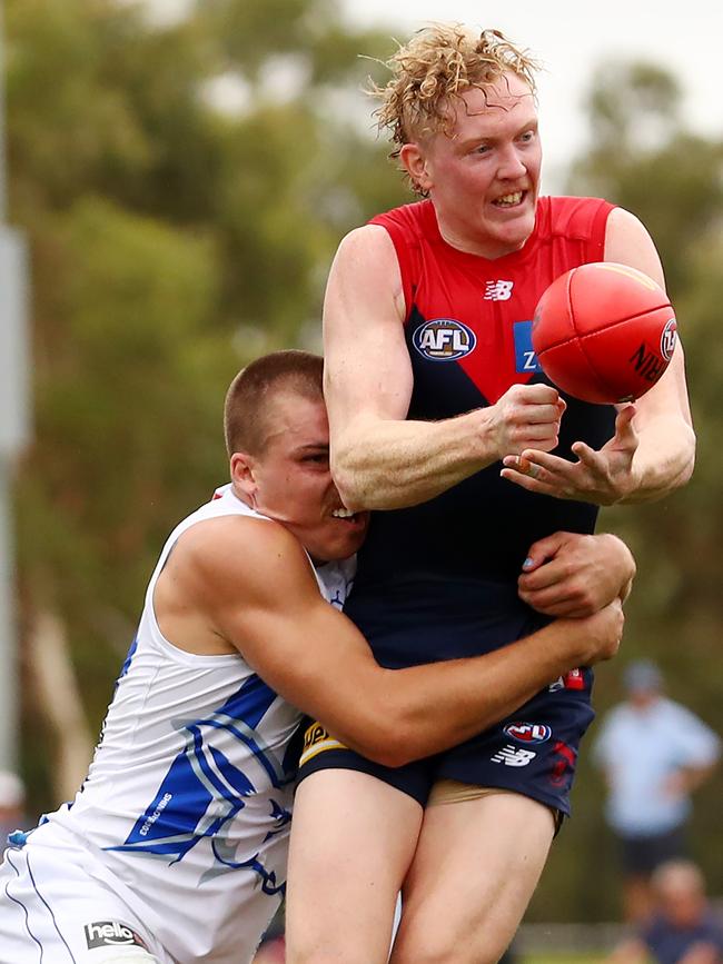 Clayton Oliver starred for the Demons despite dislocating his finger. Picture: Kelly Defina/Getty Images