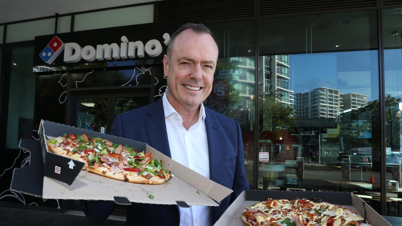 Domino's CEO Don Meij with pizzas at a Domino's store. Picture: Annette Dew