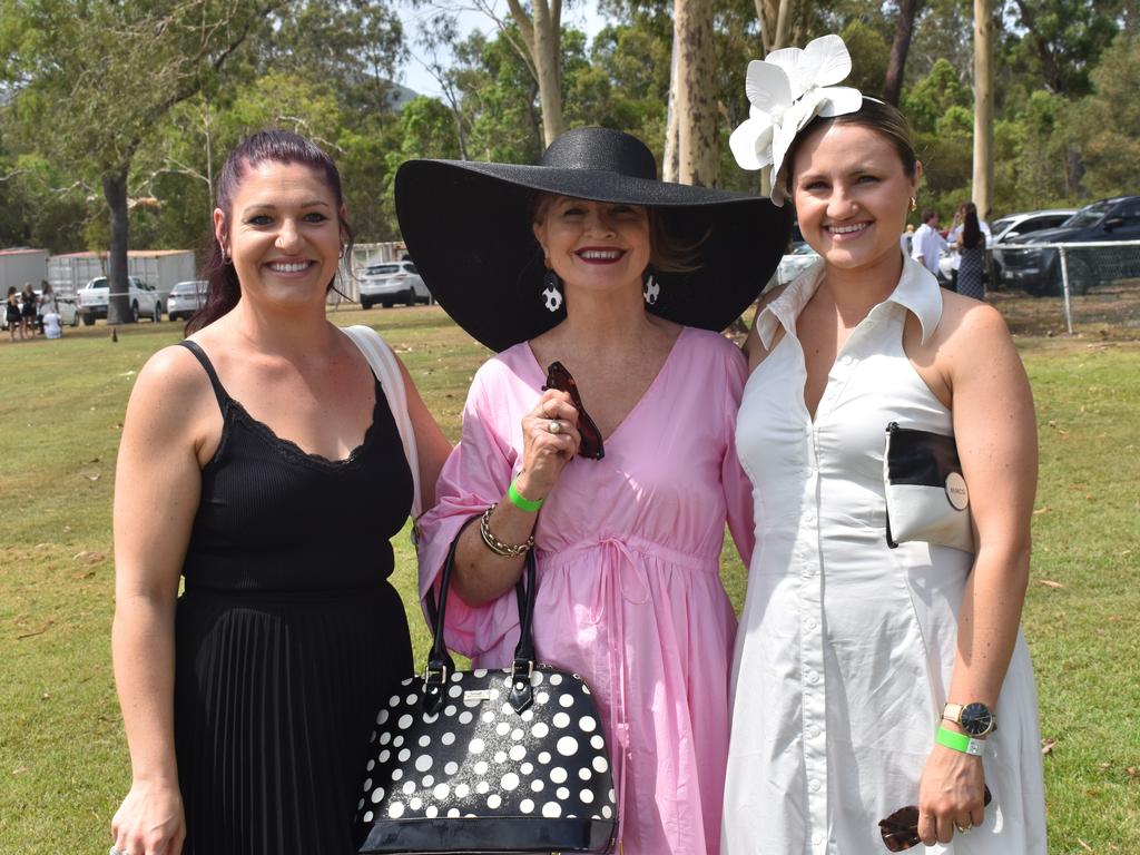 Lydia McCarthy, Patricia Neumann and Lizzy Wheeler at the Yeppoon Turf Club's Derby Day races at Keppel Park Racecourse on November 2, 2024.