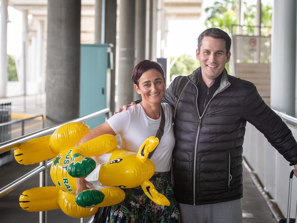 Audine Bartlett hugs brother Grant Bartlett at Brisbane International airport as borders re-open. Picture: Brad Fleet