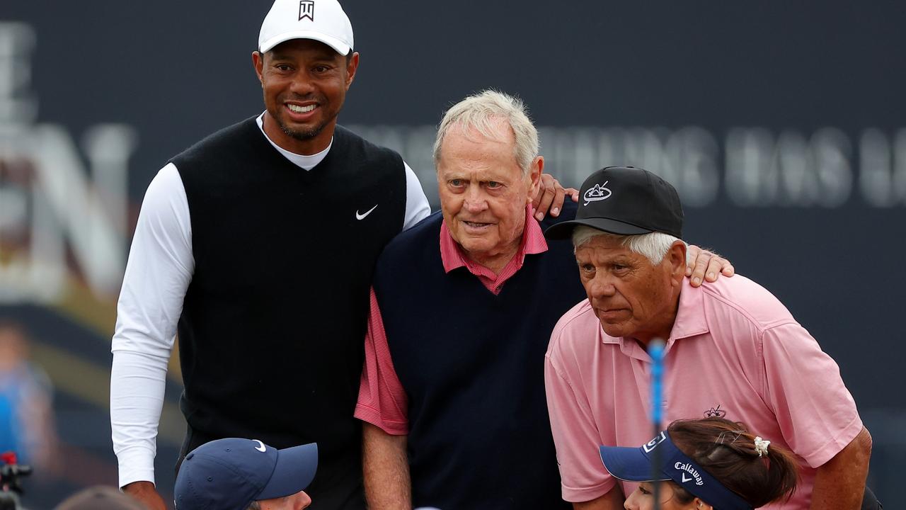 Tiger Woods and Lee Trevino poses for a photo with Jack Nicklaus. Photo by Kevin C. Cox/Getty Images.