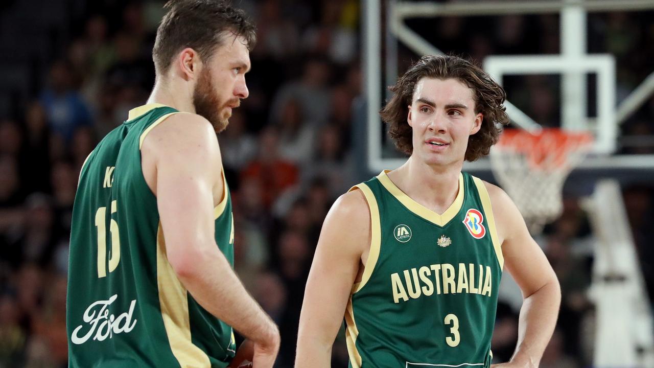 Josh Giddey (right) says he is eager to resume his international basketball career as the Boomers arrive in camp in Melbourne ahead of the Olympic Games. Picture: Kelly Defina / Getty Images