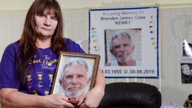 Milly Giles, wife of truck driver Brenden Giles who died on the road at Truro in a dust storm in 2019, at home with his portrait. Picture: Brenton Edwards