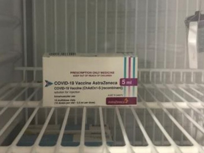 An empty fridge at an Inner City Sydney GP practice, with only one box of vaccines left for waiting patients. Supplied