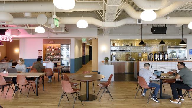 Members work on laptop computers in a common room at a WeWork office in San Francisco, California, late last year. Picture: Bloomberg