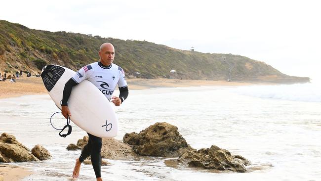 Kelly Slater prepares to enter the water during the 2024 Rip Curl Pro Bells Beach.