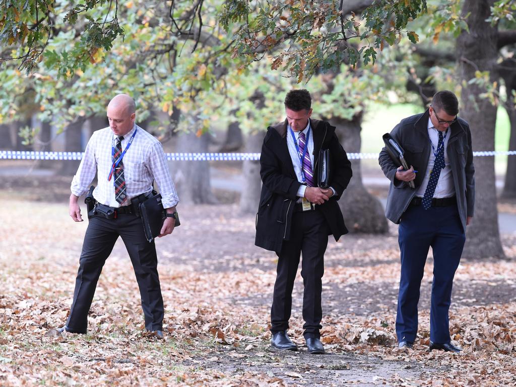 Police and detectives at Fawkner Park. Picture: Lawrence Pinder