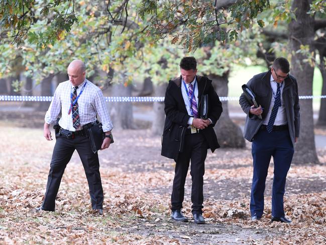 Police and detectives at Fawkner Park. Picture: Lawrence Pinder