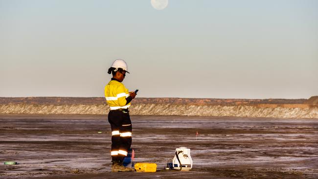 An Arca technician measures flux rates in WA.