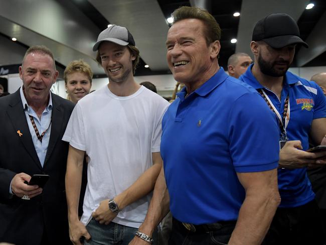 American actor Arnold Schwarzenegger (right) with his son Patrick Schwarzenegger pictured in Melbourne on Friday. Schwarzenegger popularised bodybuilding as a sport in the 1980s. Picture: Tracey Nearmy / AAP