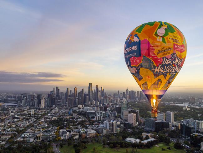 PHOTOGRAPHERS CHOICE BEST OF 2021 HERALD SUN  Global BallooningÃs ÃA Love Letter to MelbourneÃ balloon takes to the sky on its maiden flight. Picture: Jake Nowakowski melbourne aerial