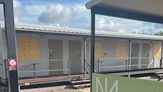 Several windows have been smashed and boarded up at the Howard Springs facility after it housed flood evacuees from Kalkarindji, Pigeon Hole and Daguragu. Picture: Supplied