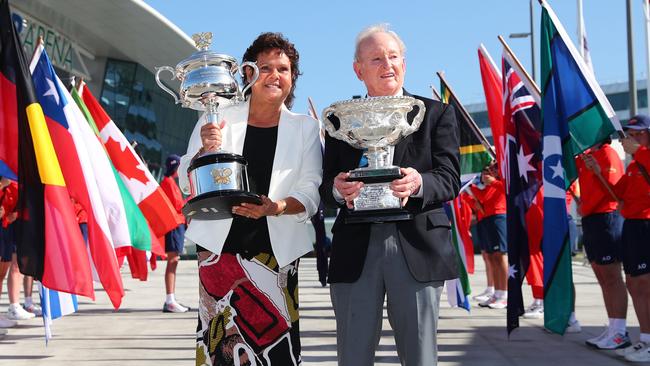 Evonne Goolagong-Cawley and Rod Laver with the Daphne Akhurst Memorial Cup and the Norman Brookes Challenge Cup at the Australian Open opening ceremony this week. Picture: Michael Dodge/Getty Images