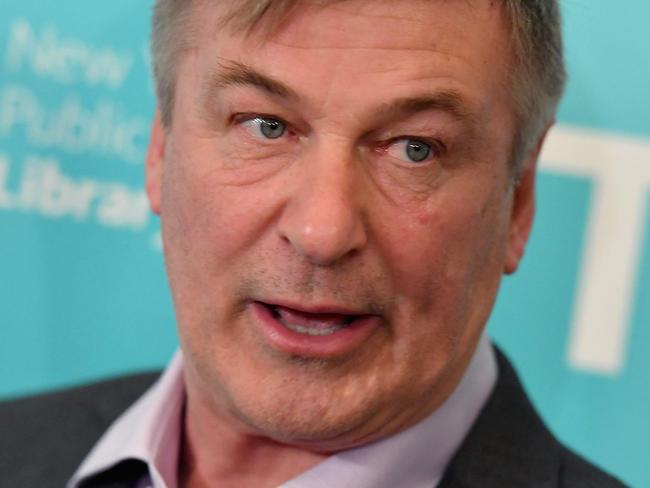 (FILES) In this file photo taken on April 01, 2019, US actor Alec Baldwin attends the premiere of "The Public" at New York Public Library in New York City. - Baldwin was the focus on October 22, 2021, of investigations into a shocking and deadly on-set tragedy, after the actor fired a prop gun that killed a cinematographer and wounded the director of a Western he was shooting in New Mexico. Halyna Hutchins and Joel Souza "were shot when a prop firearm was discharged by Alec Baldwin," the sheriff in Santa Fe said in a statement. Hutchins, 42, was transported to hospital by helicopter but died of her wounds, while Souza, 48, was taken by ambulance and was receiving treatment. (Photo by Angela Weiss / AFP)