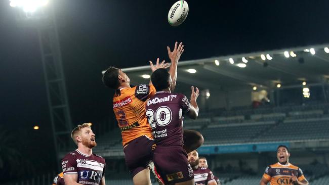 Xavier Coates flies high for the Broncos. Picture: Cameron Spencer/Getty Images