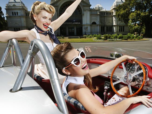 CAPTION CORRECTION. Cruising in style, Zoe Nieuwenhuis and Chloe Balfe wearing 50's inspired fashion with a rare prototype Mercedes SL 220 convertible for 60th anniversary and relaunch of Mercedes SL at Motorclassica in the Royal Exhibition Building. Picture: David Caird.