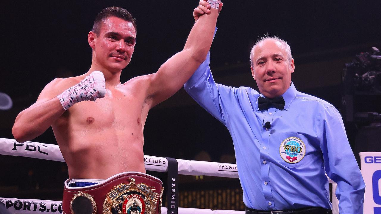 MINNEAPOLIS, MN - MARCH 26: Tim Tszyu (white with blue trunks) v Terrell Gausha (white with red and gold trunks) box in the Super Welterweight main event at the Armory on March 26, 2022 in Minneapolis, United States. Tszyu, in his USA debut defeated Gausha by judges decision. (Photo by Adam Bettcher/Getty Images)