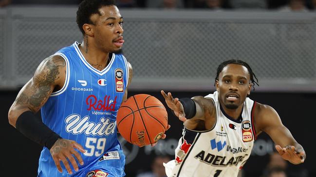 Rayjon Tucker of United comes under pressure from Antonius Cleveland. Picture: Daniel Pockett/Getty Images