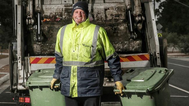 Former Geelong and Bombers footballer John Barnes is now a garbage man. Picture: Colleen Petch