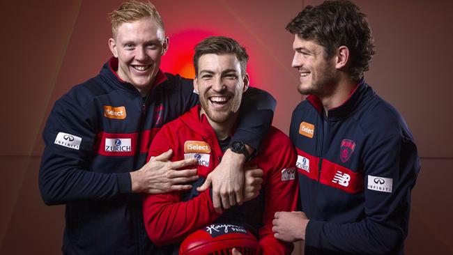 Melbourne midfielders Clayton Oliver, Jack Viney and Angus Brayshaw.