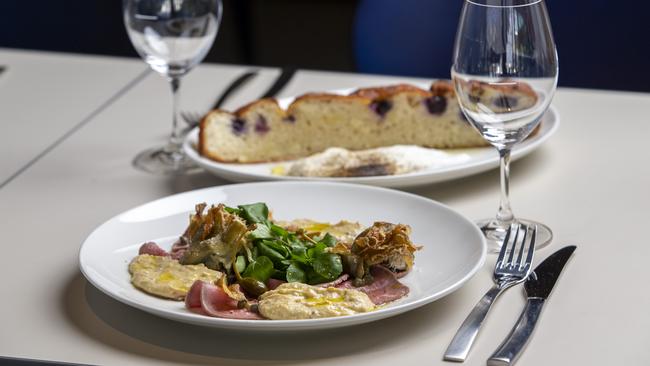 Vitello tonnato served with potato bread with blueberries and curd. Picture: Wayne Taylor.