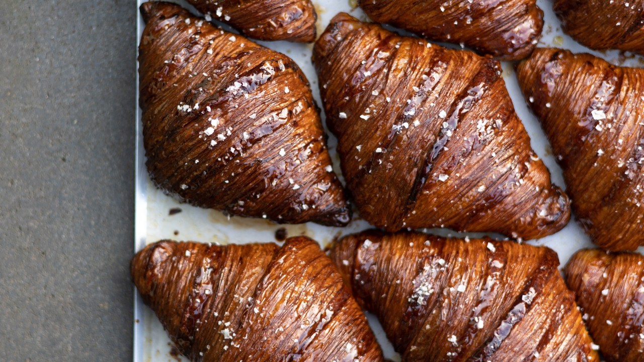 <h2>A leatherwood honey croissant in Melbourne, Victoria</h2><p><span>Melbourne is no stranger to cult croissants, but this North Carlton fixture may well be one of its best-ever efforts. The bijou digs housing the fancily titled Montforte Viennoiserie sees queues lining up for the glossily perfect, left-of-centre takes on the French staple by pastry chef Giorgia McAllister Forte. The menu changes regularly, but Forte&rsquo;s signature bake will never go out of rotation. Our favourite sees the crescent glazed with a leatherwood honey gloss and finished with fat flakes of sea salt that melt on the tongue and give an excellent counterpunch to the honey&rsquo;s floral notes. Addictive? Oui.</span></p>