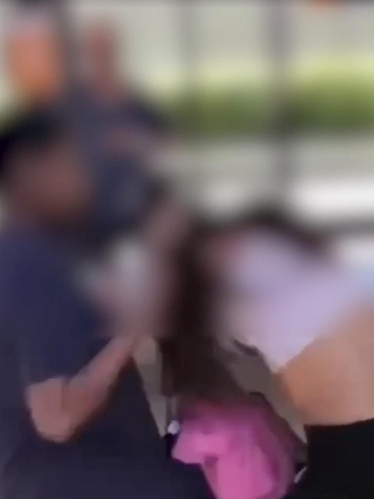 Confronting footage has emerged of a group of girls bashing another getting off a Woolloongabba bus stop. Picture: Supplied