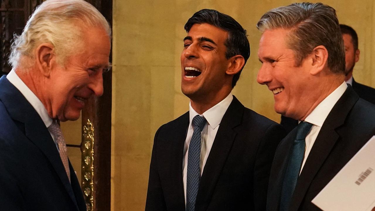Head of state King Charles III (L) with Prime Minister Rishi Sunak (C) and opposition Labour Party leader Kier Starmer last year. (Photo by Unknown / POOL / AFP)