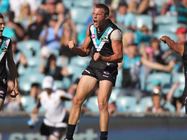 Jason Davenport celebrates a goal during his time at Port Adelaide.  