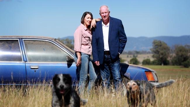 Ex detective and cold case specialist Damian Loone and Rachelle Childs sister Kristy stand with Rachelle's Commodore. Picture: Jeff Darmanin