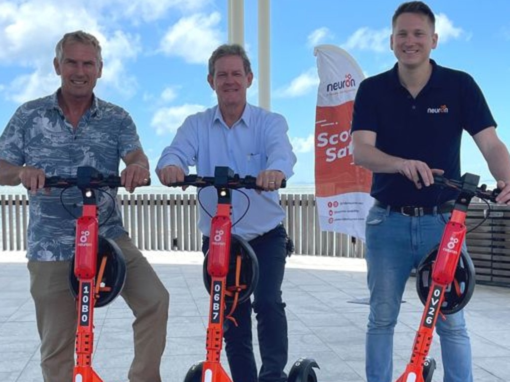 Councillor Pat Eastwood and Mayor Andy Ireland on the new Neuron e-scooters.