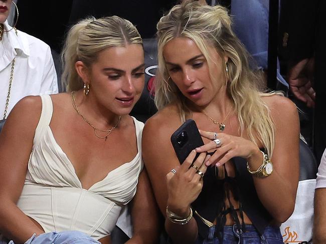 MIAMI, FLORIDA - JUNE 09: Haley and Hanna Cavinder are seen in attendance during Game Four of the 2023 NBA Finals between the Denver Nuggets and the Miami Heat at Kaseya Center on June 09, 2023 in Miami, Florida. NOTE TO USER: User expressly acknowledges and agrees that, by downloading and or using this photograph, User is consenting to the terms and conditions of the Getty Images License Agreement. (Photo by Megan Briggs/Getty Images)