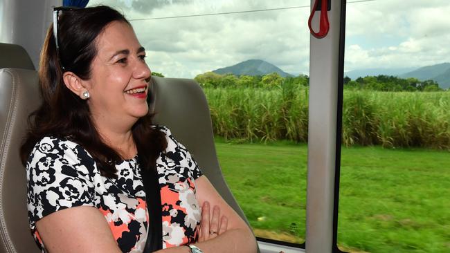 Premier Annastacia Palaszczuk on the media bus during the Queensland election campaign in Cairns. Picture: Darren England/AAP