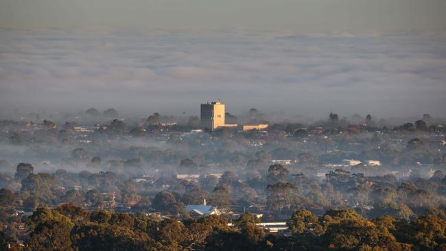 Thick fog over the city and suburbs photographed from Skye Pictures/Russell Millard