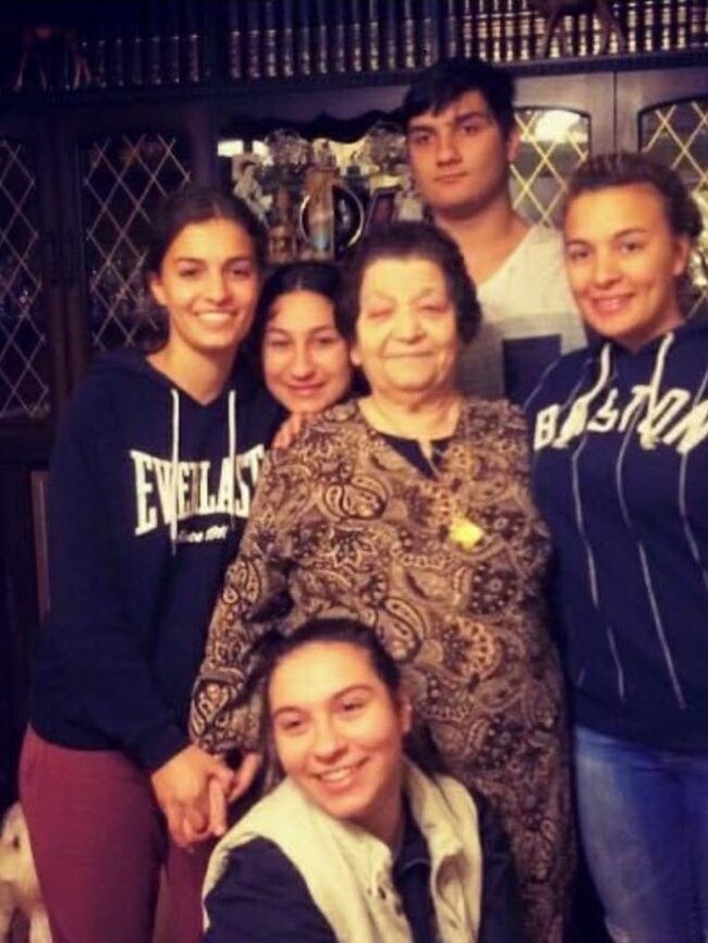 Maria Vasilakis, 81, with her grandchildren.