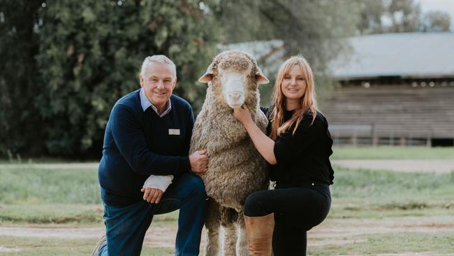 Ross McGauchie and daughter Claire McGauchie, with the ram 'Kiwi', who sold privately for $20,000 at the McGauchie's Terrick West Poll Merino stud sale at Prairie.