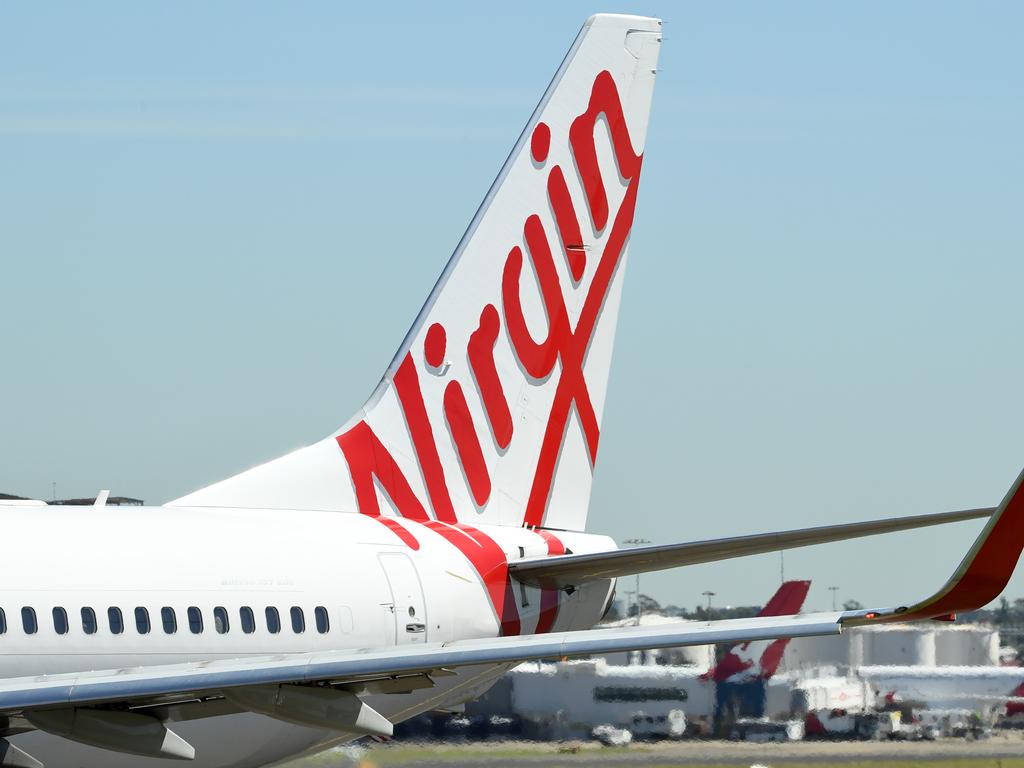 Airports, aircraft manufacturers and air navigation service providers will also be under financial stress. Picture: AAP Image/Joel Carrett.