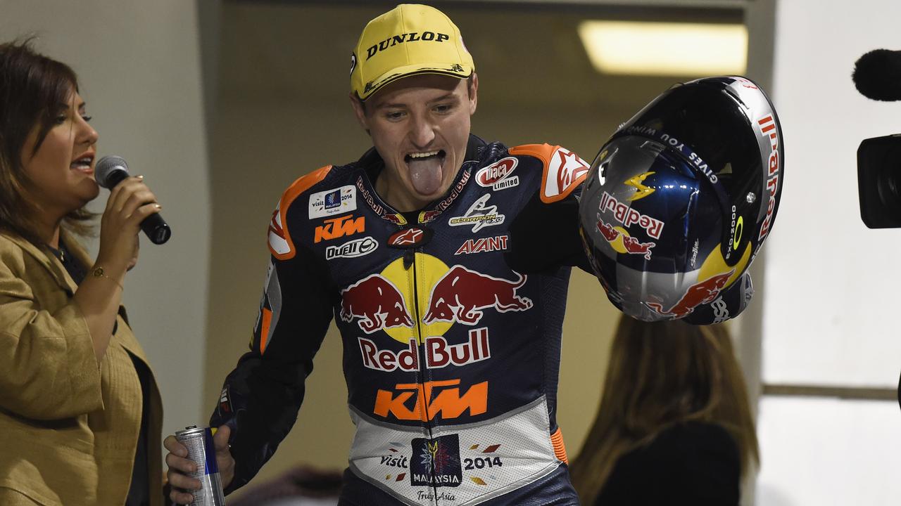Jack Miller celebrates the victory on the podium in Qatar in 2014.