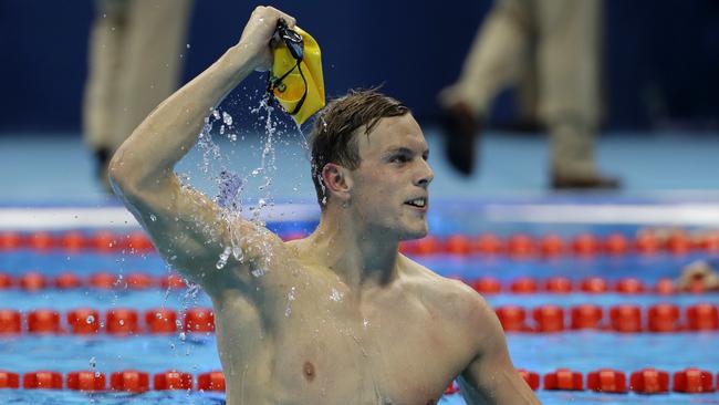 Australia's Kyle Chalmers celebrates winning the gold in the men's 100m freestyle.